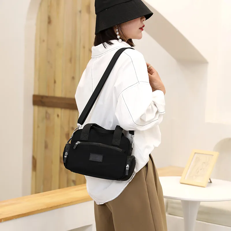 Leccio Aqua Shade Crossbody Bag - Image 19